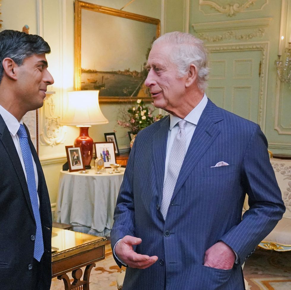 britain's king charles iii r speaks with britain's prime minister rishi sunak at buckingham palace