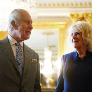 king charles and queen camilla are presented with the coronation roll
