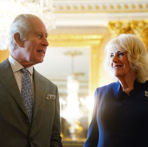 king charles and queen camilla are presented with the coronation roll