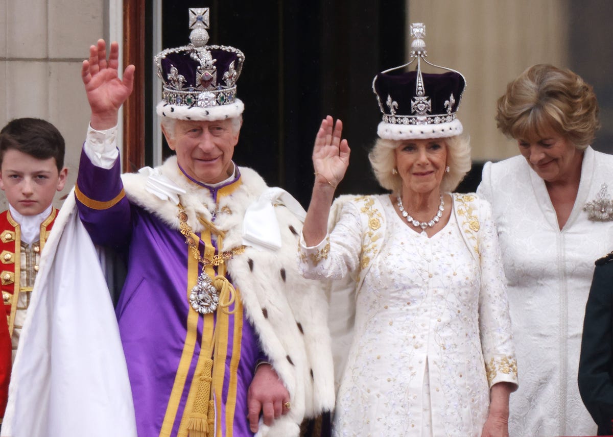 The Queen Consort arrives at Coronation in embroidered dress