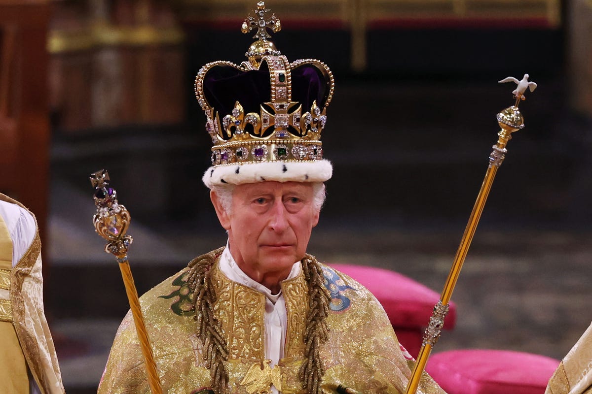 King Charles and Queen Camilla appear on balcony