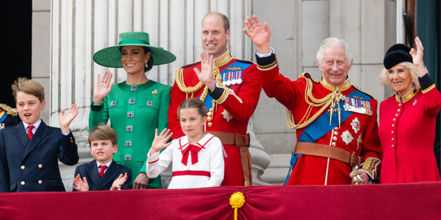 Charles presents flag to mounted cavalry ahead of first birthday parade