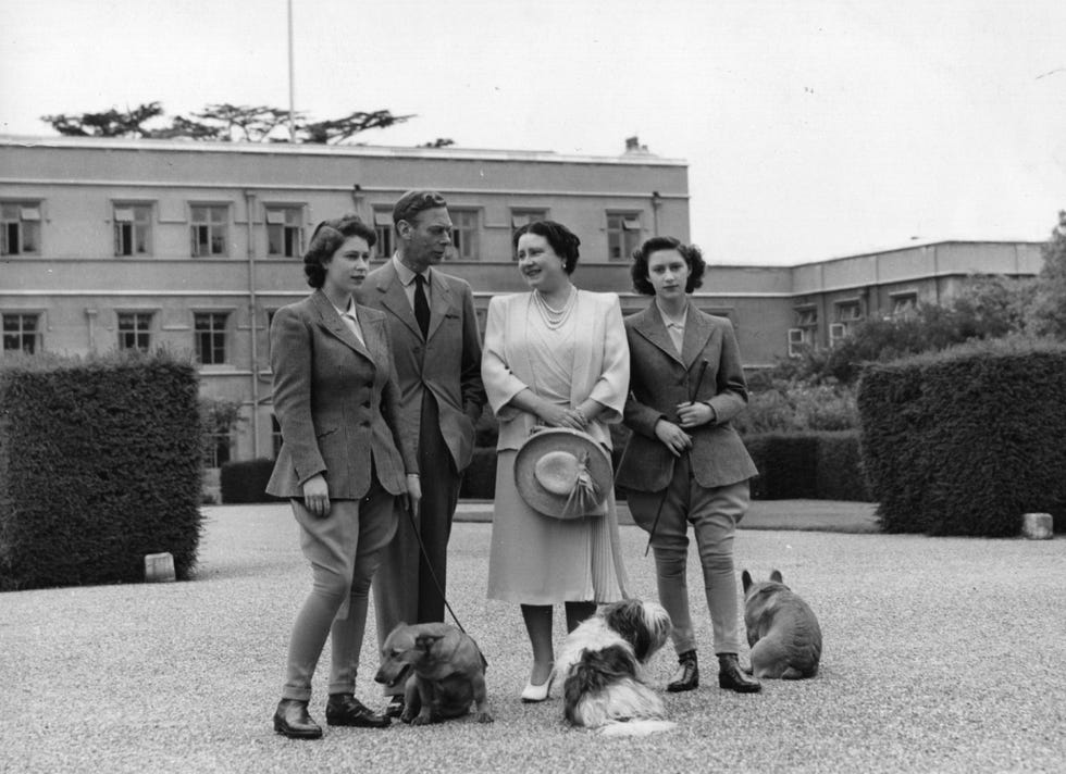 king george vi and queen elizabeth with their daughters, princess margaret rose and princess elizabeth