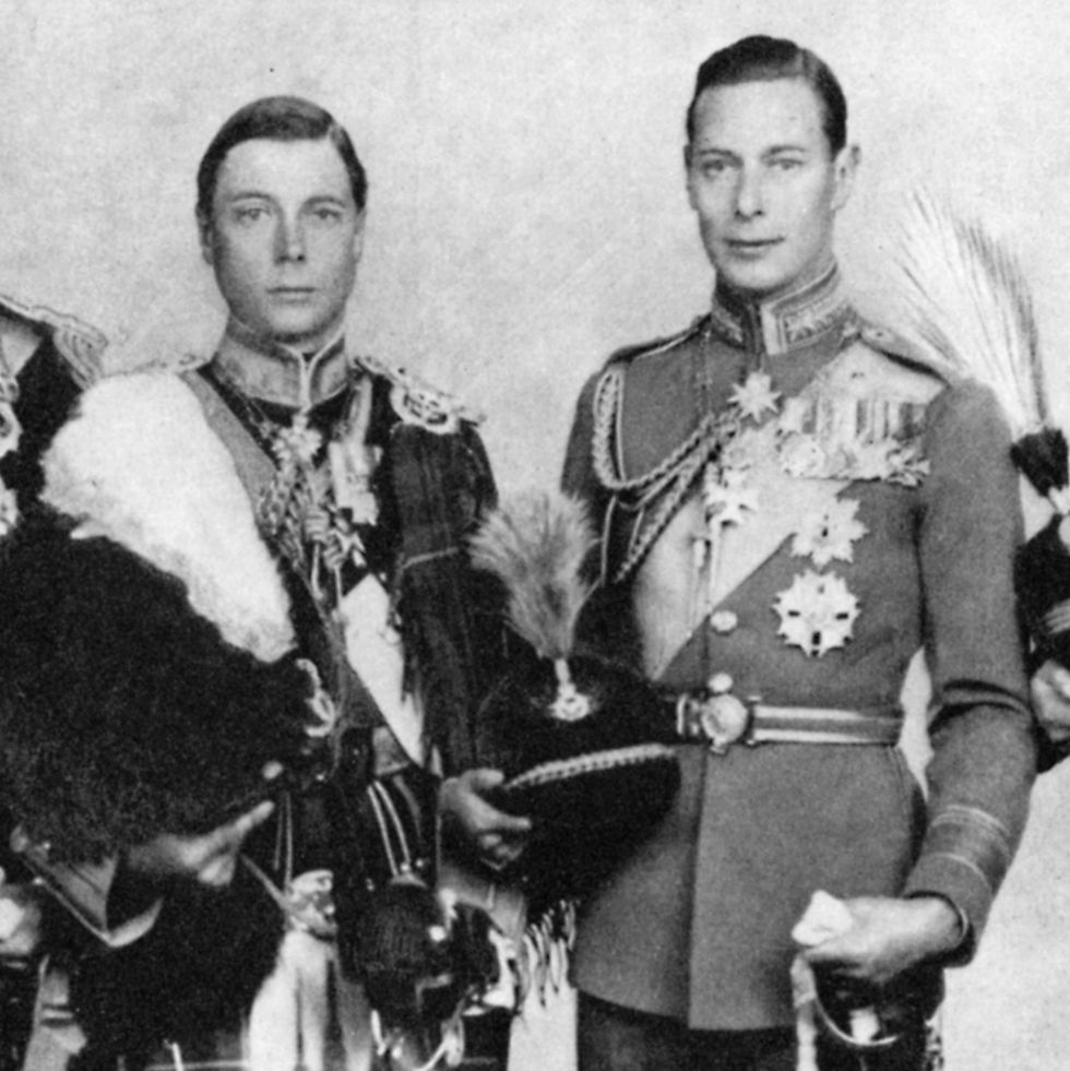 king edward viii and king george vi stand and look at the camera, both men are wearing decorated military uniforms