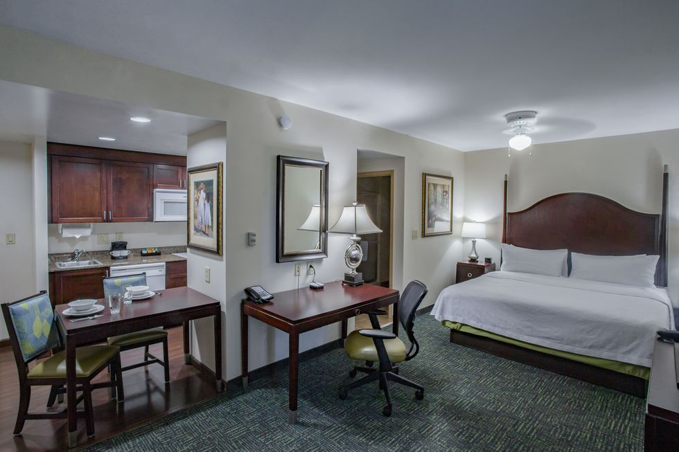 homewood suites by hilton davidson hotel room featuring a king bed