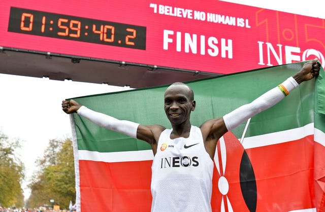 kenyas eliud kipchoge celebrates in the finish area of a special course after busting the mythical two hour barrier for the marathon on october 12 2019 in vienna   with a timing of 1hr 59min 402sec, the olympic champion became the first ever to run a marathon in under two hours photo by herbert neubauer  apa  afp  restricted to editorial use photo by herbert neubauerapaafp via getty images