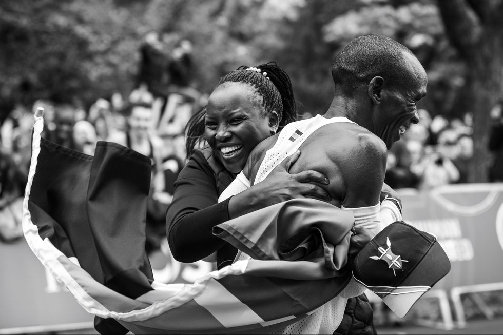 kipchoge and his wife grace embrace after the ineos challenge