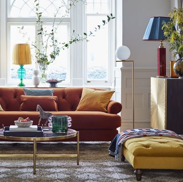 a living room with a couch and a coffee table