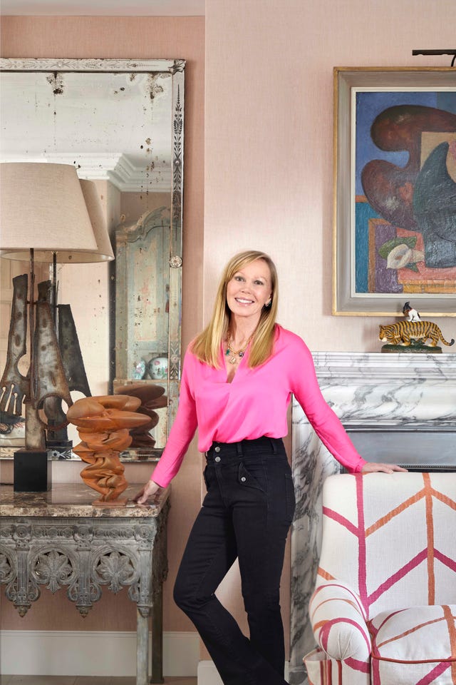 interior designer kit kemp next to her treasured object, a sculpture by tony cragg photography by simon brown