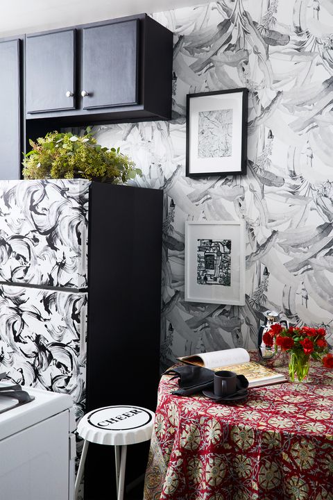 small black and white wallpapered kitchen