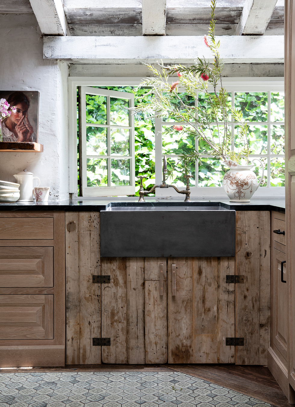 a kitchen with wood cabinets