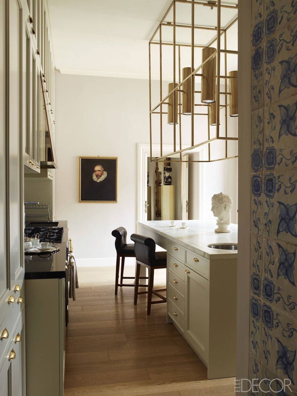 a room with a desk and chairs