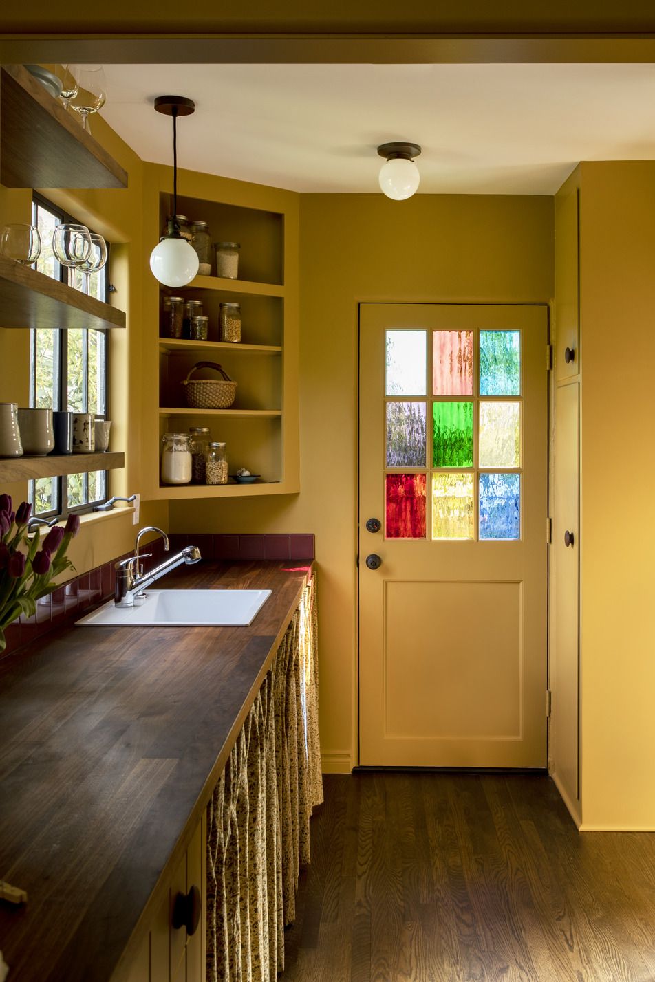 kitchen door with stained glass window home by reath design