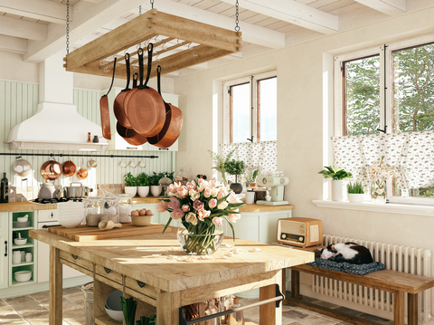 kitchen backsplash ideas, pistachio paneling in the kitchen with hanging copper pots