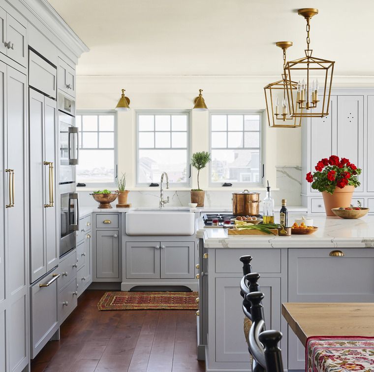 new england home by designer katie rosenfeld kitchen with gray cabinets and kitchen island painted in silver lining by benjamin moore