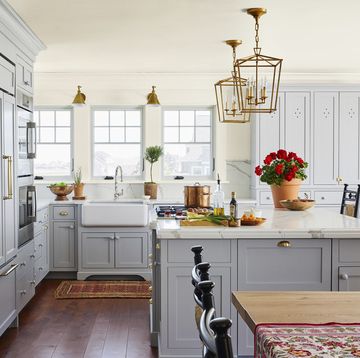 new england home by designer katie rosenfeld kitchen with gray cabinets and kitchen island painted in silver lining by benjamin moore