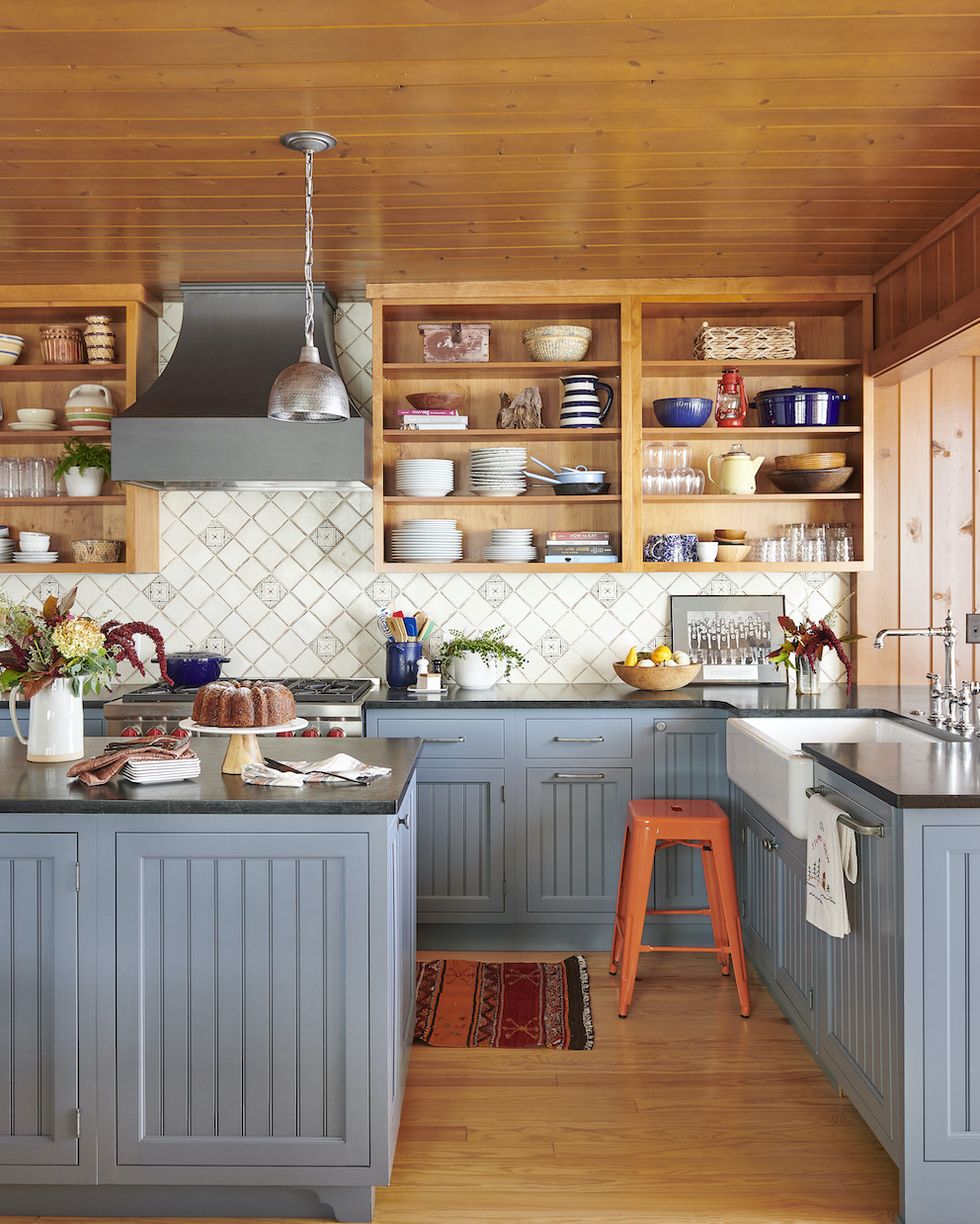rustic kitchen with blue cabinets