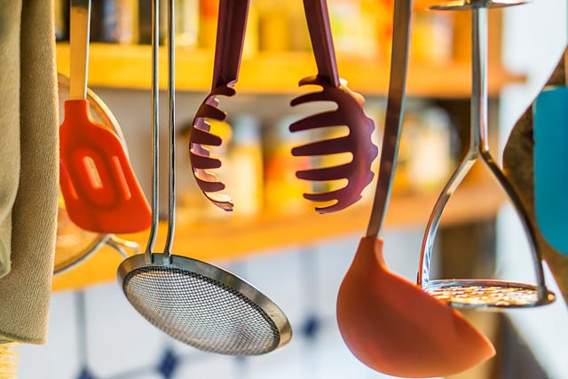 Utensil Stand Hanging On Kitchen Wall High-Res Stock Photo - Getty Images