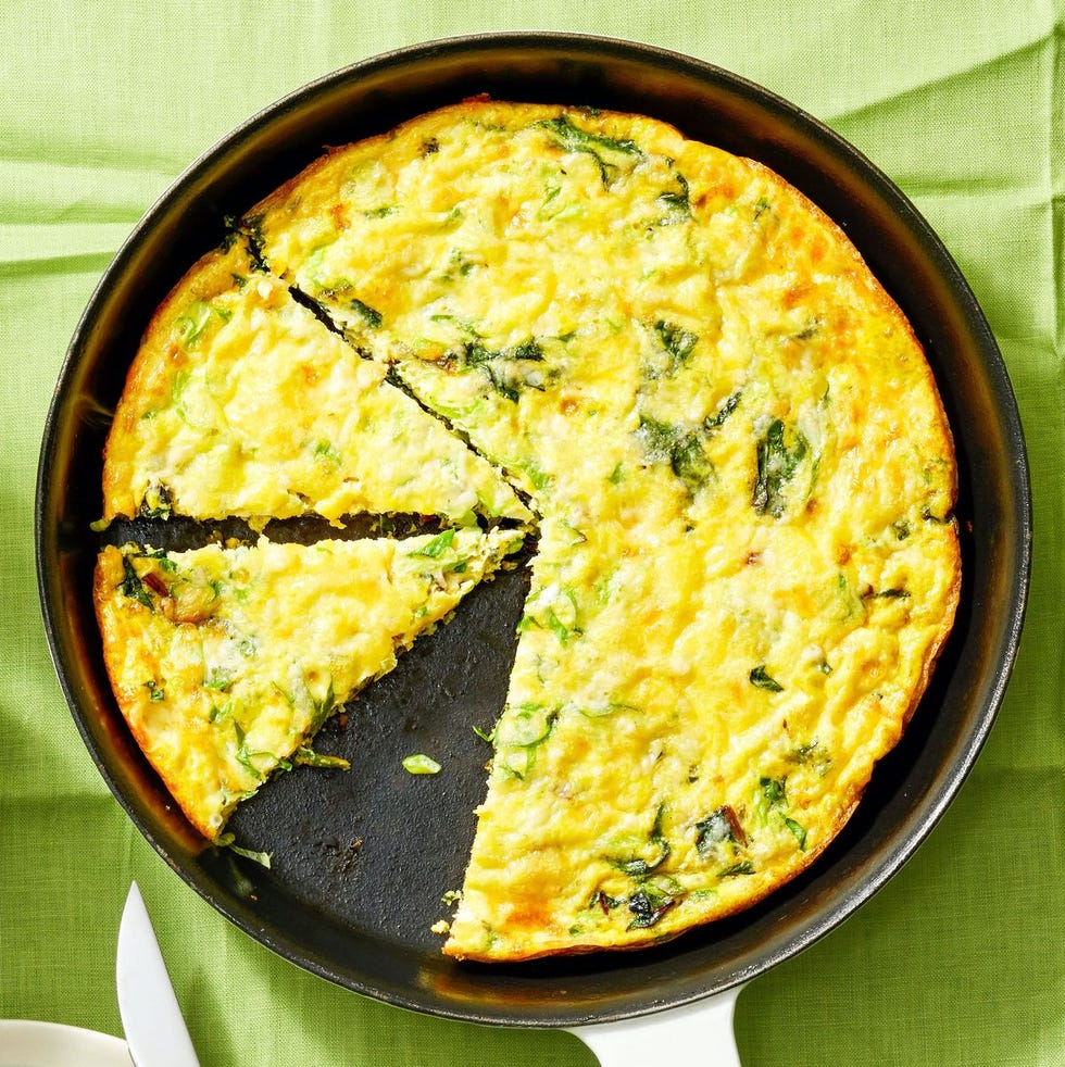 egg frittata in a pan with herbs