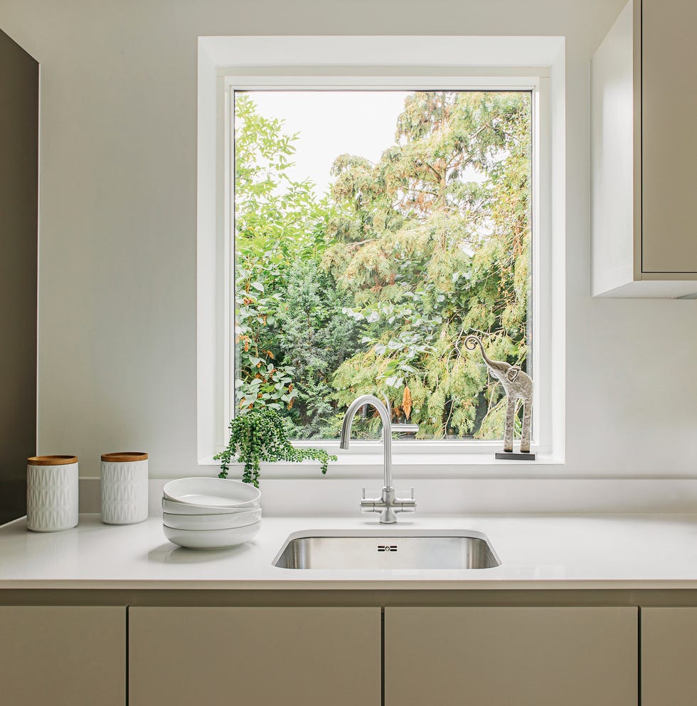 kitchen sink with a nature view