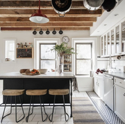 kitchen trends 2022, white kitchen with wood beams