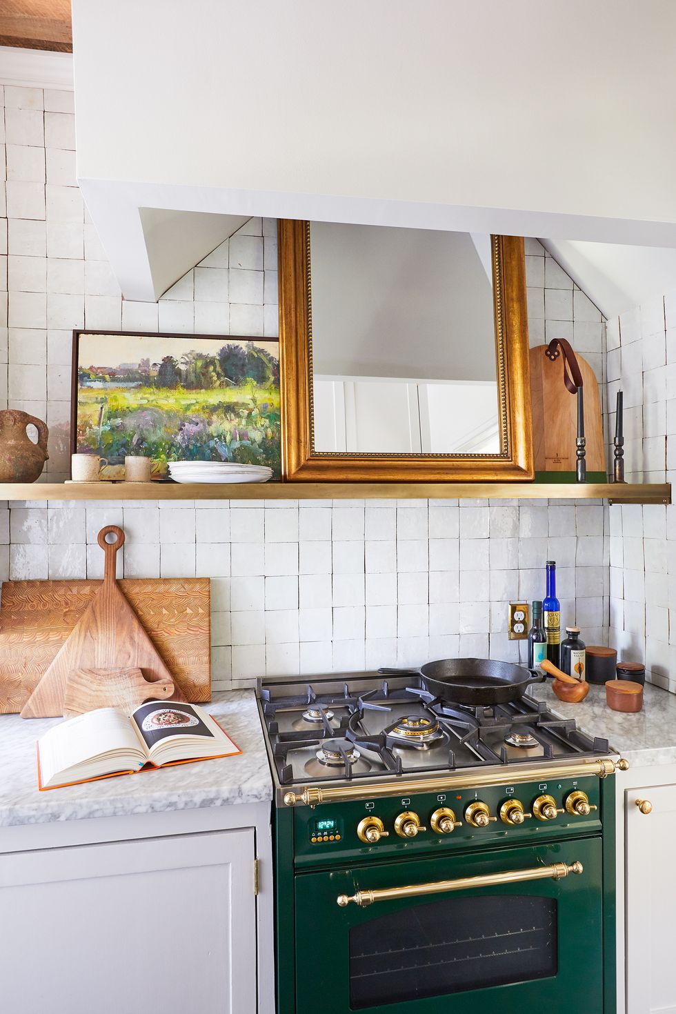 kitchen with mirror and art