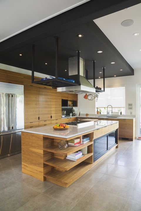 kitchen island idea with american walnut wood island inset with a cook top