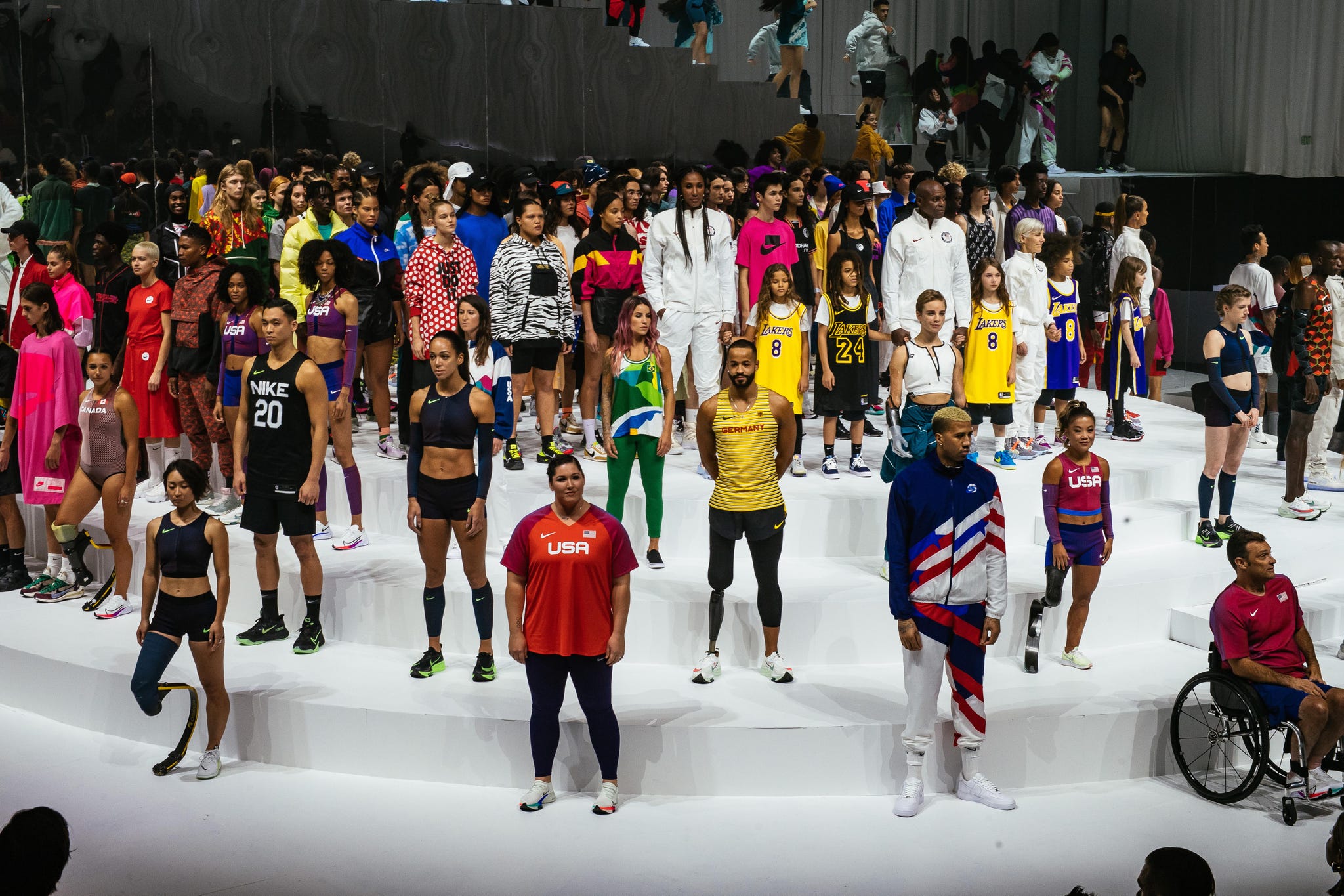 Fashion, Event, Runway, Fashion show, Crowd, Fashion design, Performance, Recreation, Competition, Ice rink, 