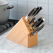 knife block set on marble counter