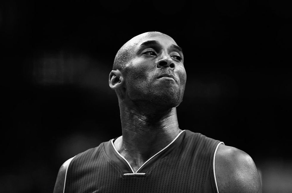 washington, dc   december 02 editors note image has been converted to black and white kobe bryant 24 of the los angeles lakers looks on against the washington wizards in the first half at verizon center on december 2, 2015 in washington, dc  note to user user expressly acknowledges and agrees that, by downloading and or using this photograph, user is consenting to the terms and conditions of the getty images license agreement  photo by rob carrgetty images