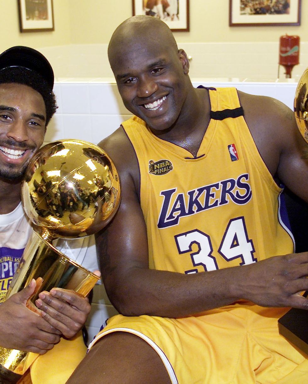 kobe bryant of the los angeles lakers with shaquille oneal