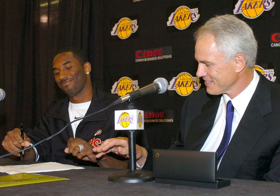 kobe bryant announces seven year 137 million dollar contract re signing with the los angeles lakers july 15, 2004