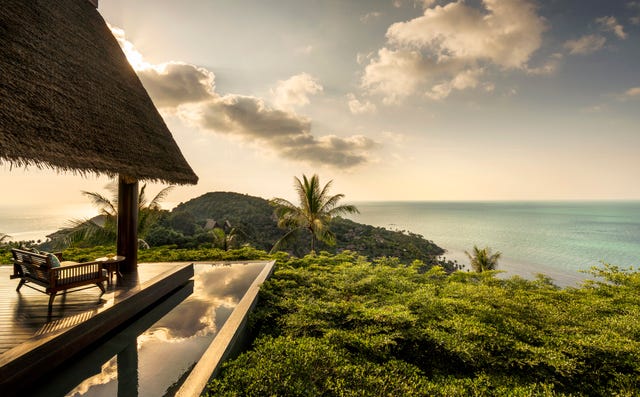 tropical landscape featuring a luxury terrace with seating four seasons koh samuioverlooking the ocean