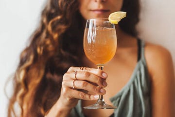 unrecognizable defocused face on background summer beverage tasty and natural organic fermented juice