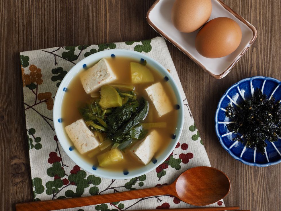korean food soybean and spinach paste stew, doenjang guk, miso soup