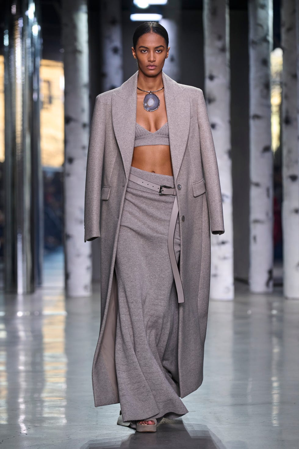 a model with a long coat