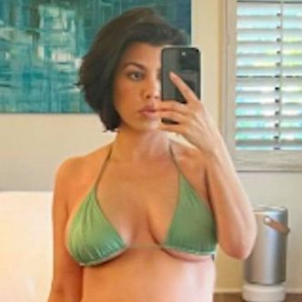 Kourtney Kardashian Shows Off Baby Bump In Skimpy Kiwi Green Bikini