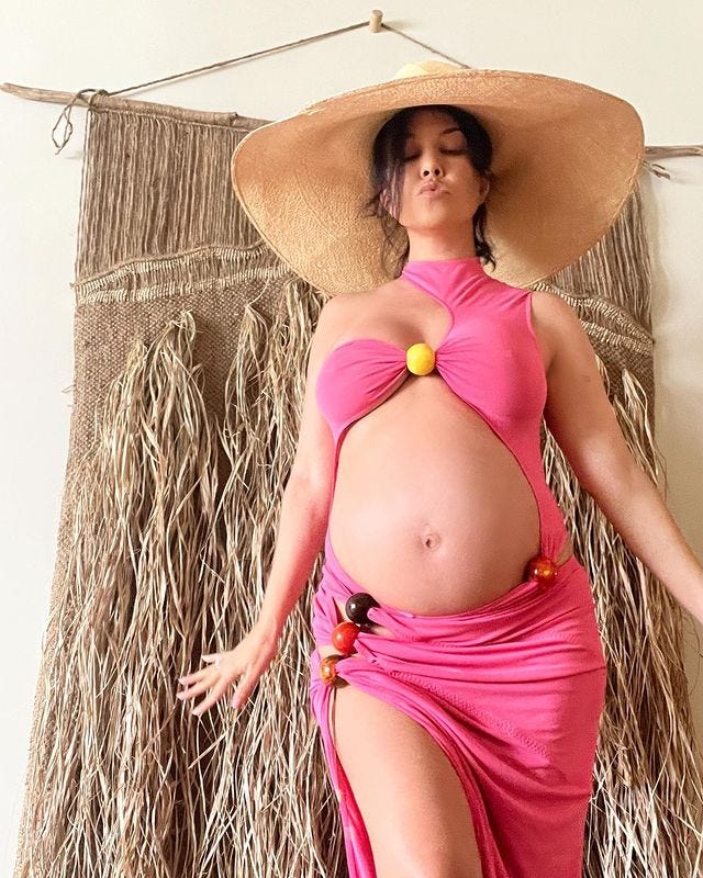 Kourtney Kardashian Shows Off Her Baby Bump in 4 Maternity Looks