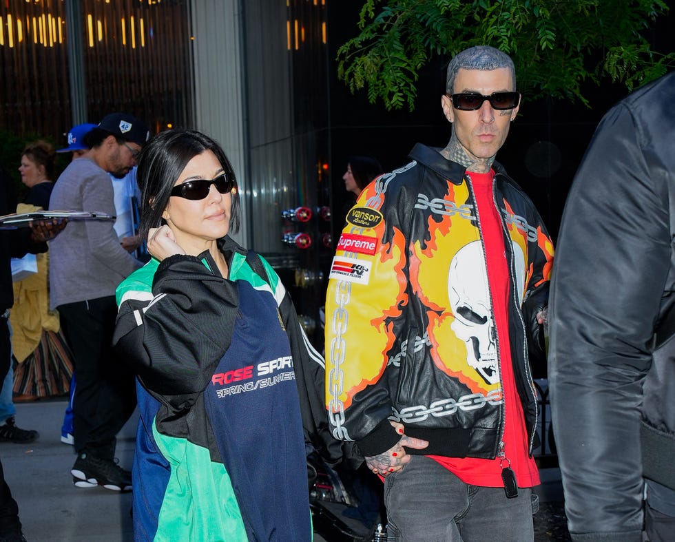 It's karat-covered shine for Kourtney Kardashian and her metallic gold  Louis Vuitton bowler bag.