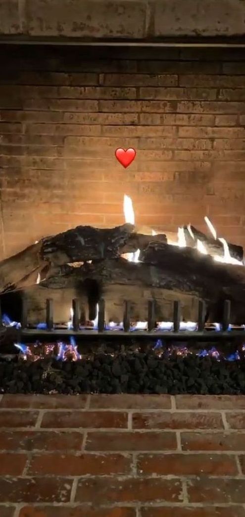kourtney kardashian takes fireplace photo on valentine's day