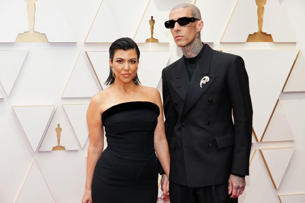 hollywood, california   march 27 l r kourtney kardashian and travis barker attend the 94th annual academy awards at hollywood and highland on march 27, 2022 in hollywood, california photo by jeff kravitzfilmmagic