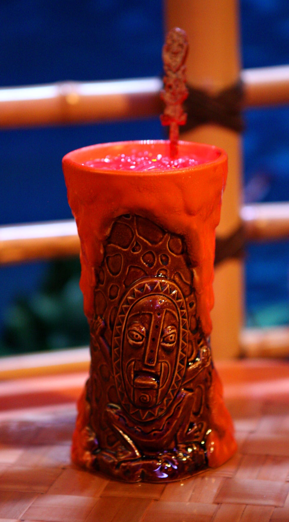 Red, Carving, Ceramic, Fictional character, Artifact, Art, 
