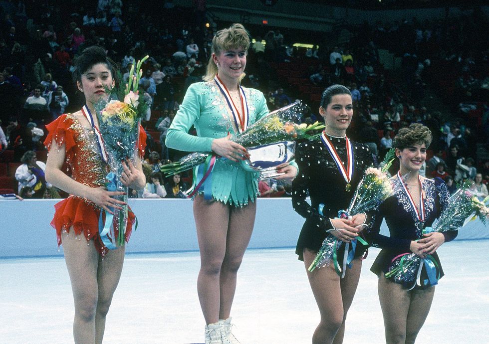 Kristi Yamaguchi, Tonya Harding, Nancy Kerrigan and Tonia Kwiatkowski poses of this photograph at the U.S. Figure Skating Championships circa 1991 at the Target Center in Minneapolis, Minnesota