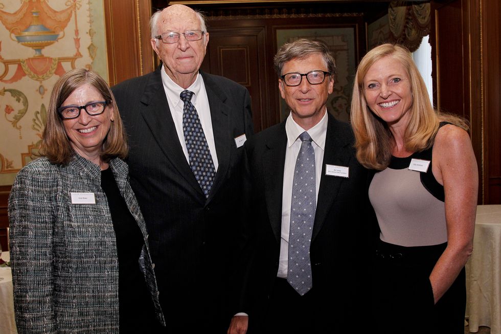 kristianne gates blake, bill gates sr, bill gates and elizabeth gates armintrout stand together and smile for a photo