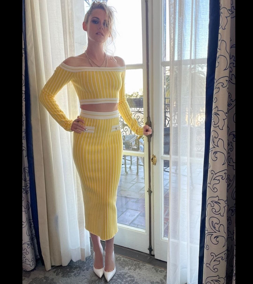 Kristen Stewart Wears Chic Yellow Crop Top and Skirt Set