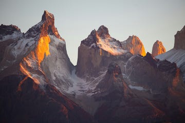 a group of mountains with snow