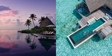 a building with a pool and a beach with a hut