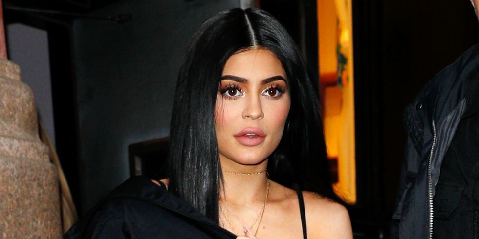 Kylie Jenner Models Neon Adidas Sneakers and a Matching Bikini