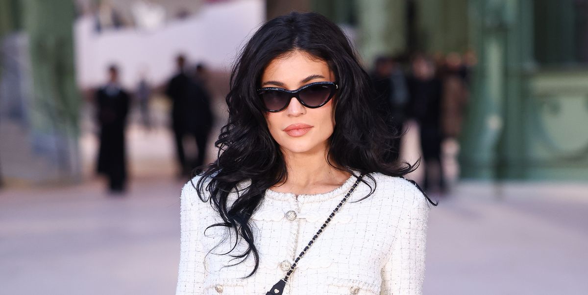 Kylie Jenner Flaunts Her Toned Torso in a White Tweed Set at Chanel’s Haute Couture Show