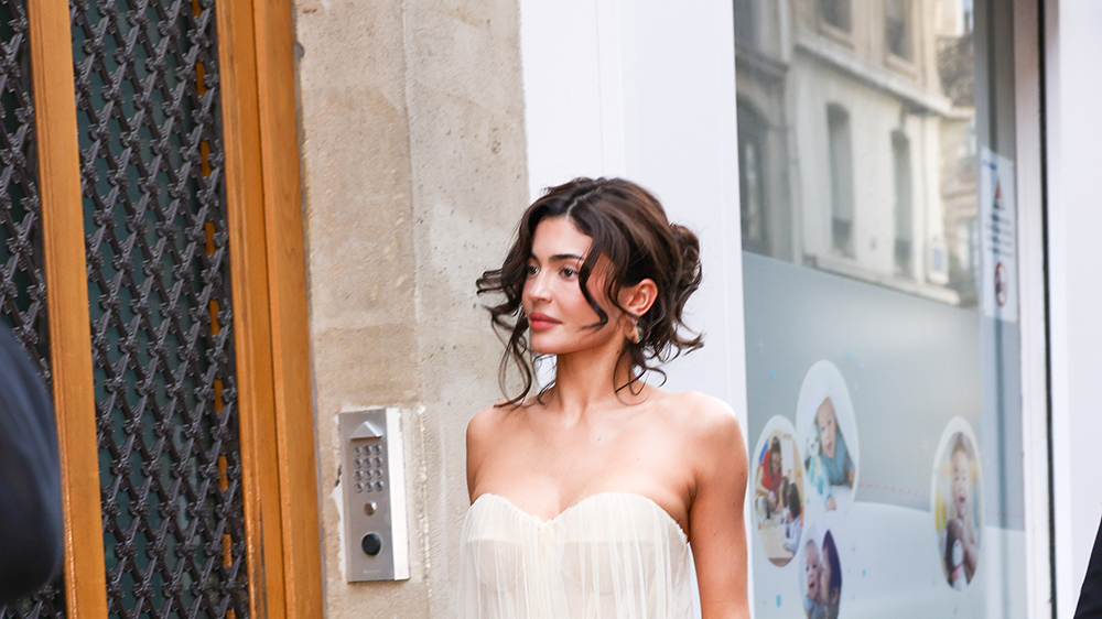 Kylie Jenner wears a sheer white corset dress in Paris